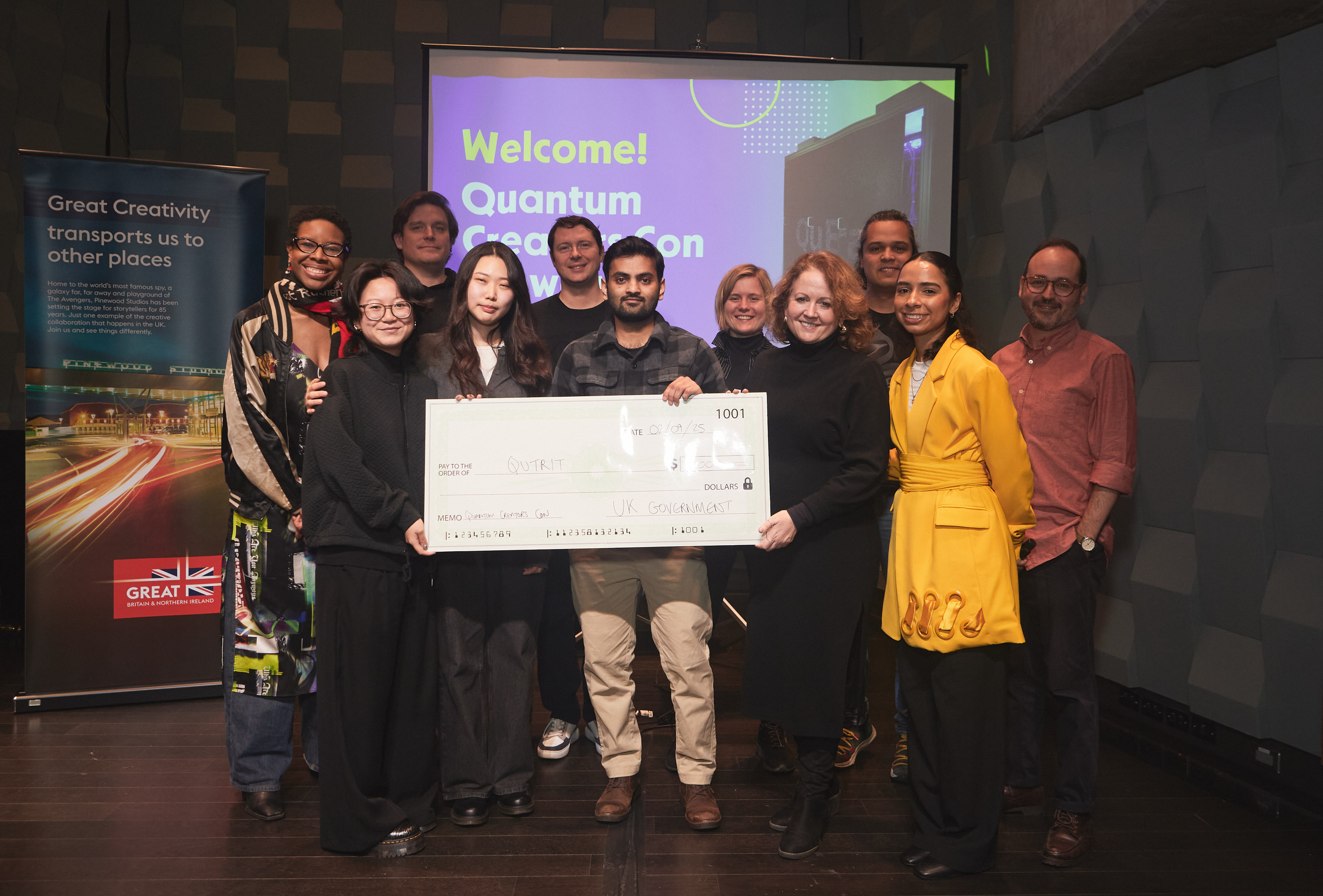 Team Qutrit pictured with the panel judges and hackathon host